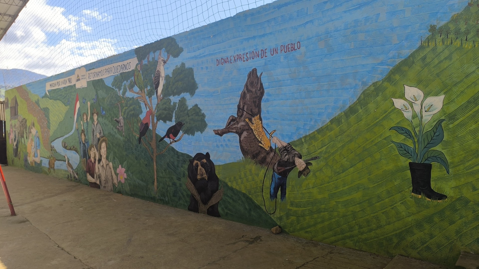 Recientemente la comunidad de la Inspección de Guayabal realizó la intervención del mural donde se hace memoria a la marcha por la vida de 1980 y a la cultura campesina. Foto: Jeisson Osorio.